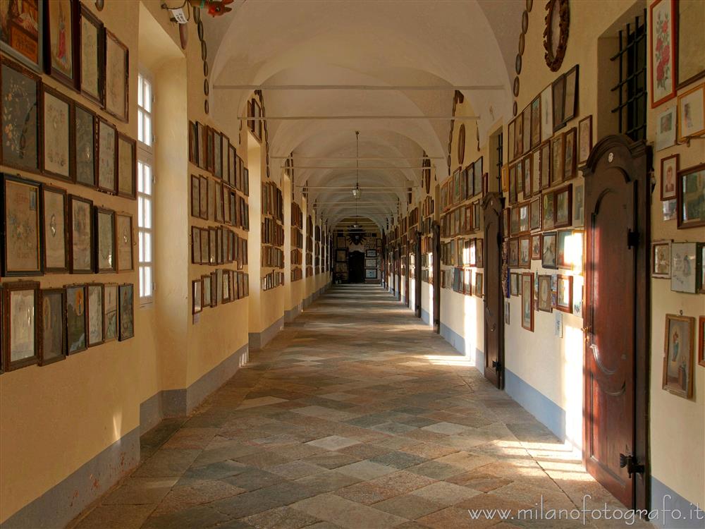 Biella, Italy - Corridor of the Sanctuary of Oropa with ex voto paintings on the walls
